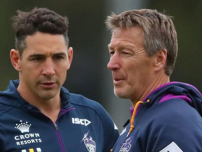 MELBOURNE, AUSTRALIA - MAY 16:  Billy Slater of the Melbourne Storm and Storm coach Craig Bellamy talk during a Melbourne Storm NRL media session at Gosch's Paddock on May 16, 2018 in Melbourne, Australia.  (Photo by Scott Barbour/Getty Images)