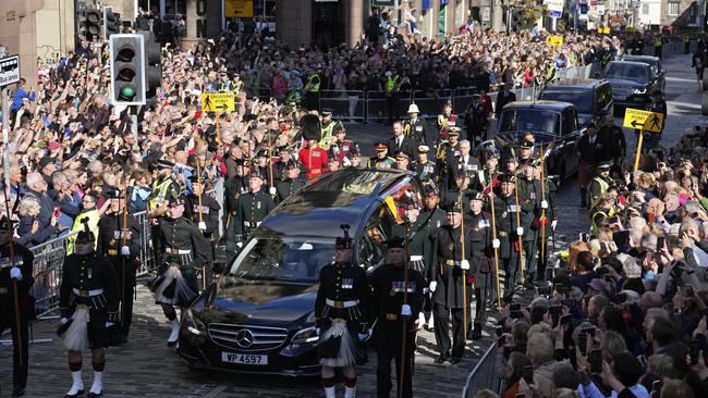 The crowd was packed along the Royal Mile during the procession. Picture: Jon Super – WPA Pool/Getty Images