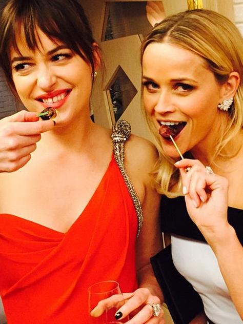 Reese Witherspoon at an Oscars party 2015 via Instagram, 50 shades of #grazing... #Horsdoeuvres #AboutLastNight #Oscars #DakotaJohnson