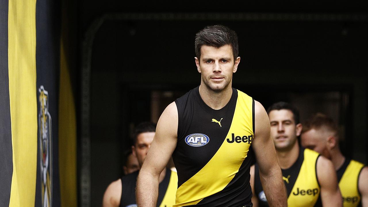 MELBOURNE, AUSTRALIA - AUGUST 07: Trent Cotchin of the Tigers leads the Tigers out during the round 21 AFL match between Richmond Tigers and North Melbourne Kangaroos at Melbourne Cricket Ground on August 07, 2021 in Melbourne, Australia. (Photo by Daniel Pockett/AFL Photos/via Getty Images)