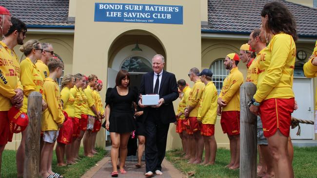 Service for the death of David Spierin at Bondi Surf Bathers Life Saving Club. Father John Spierin and David’s partner Nicky Kwen with his ashes.