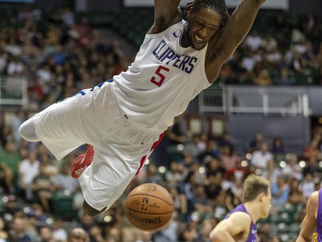 Los Angeles Clippers forward Montrezl Harrell (5) swings from the basket after dunking. Picture: AP Photo