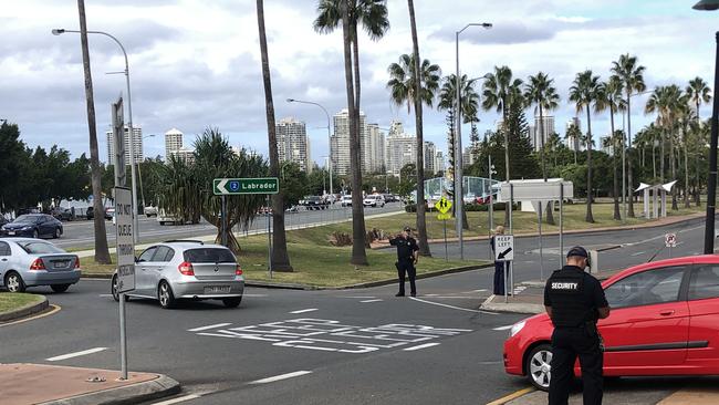 Police directing cars leaving the Australia Fair car park away from the scene.