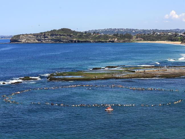 The paddle-out to spread Lachaln’s ashes. Picture: Surf Photos For You