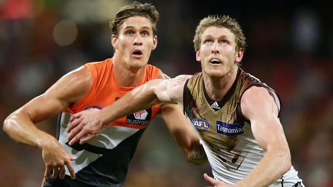 Rory Lobb and Ben McEvoy tussle at a boundary throw-in.