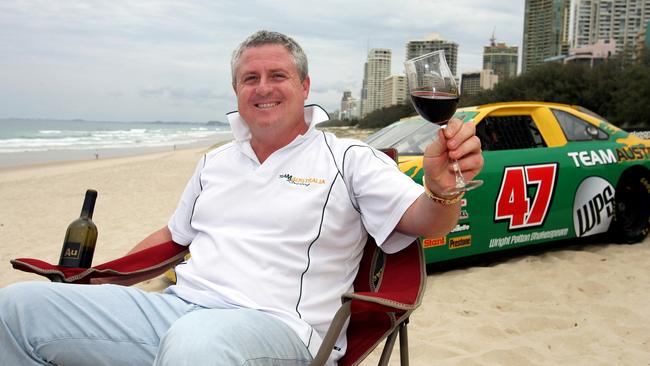 Craig Gore on Surfers Paradise Beach in 2006 in his capacity as Team Australia NASCAR boss. Picture: Adam Head