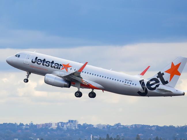 SYDNEY, AUSTRALIA - NewsWire Photos JUNE 14, 2021: A view of a Jetstar plane taking off at Sydney Domestic Airport from Port Botany in Sydney Australia. Picture: NCA NewsWire / Gaye Gerard