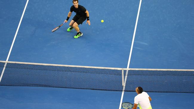 MELBOURNE, AUSTRALIA - JANUARY 27: Andy Murray of Great Britain plays a forehand in his quarterfinal match against Nick Kyrgios of Australia during day nine of the 2015 Australian Open at Melbourne Park on January 27, 2015 in Melbourne, Australia. (Photo by Scott Barbour/Getty Images)