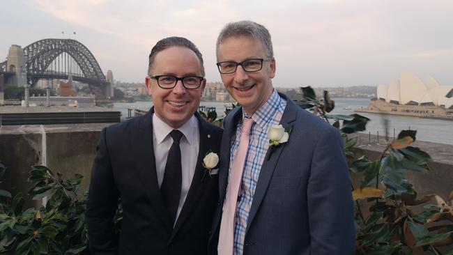 Qantas CEO Alan Joyce, left, pictured in 2019 with his brother Anthony, who is a corporate actuary at Medibank.