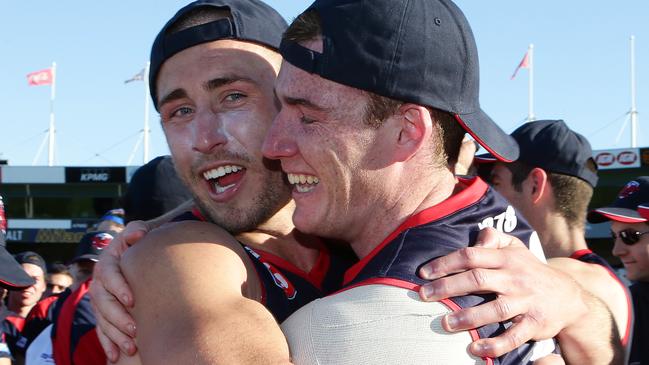 Matt Thomas and Matthew Fuller celebrate after winning a SANFL premiership with Norwood. Picture: Sarah Reed.