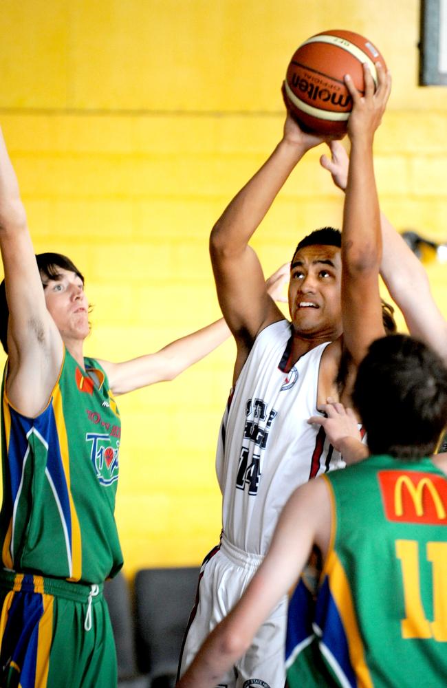 Alphonso Horomia from Brisbane State High grabs a rebound at the State Championships in 2010.