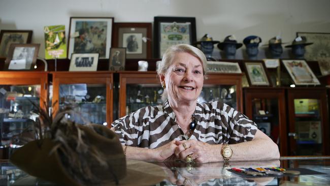 Rhonda McGuigan, owner of Southside Antiques Centre, in 2017 with military memorabilia. Picture: AAP/ Ric. Frearson