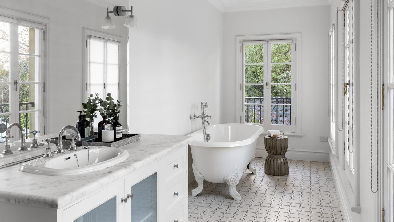 The bathroom with claw-foot tub.