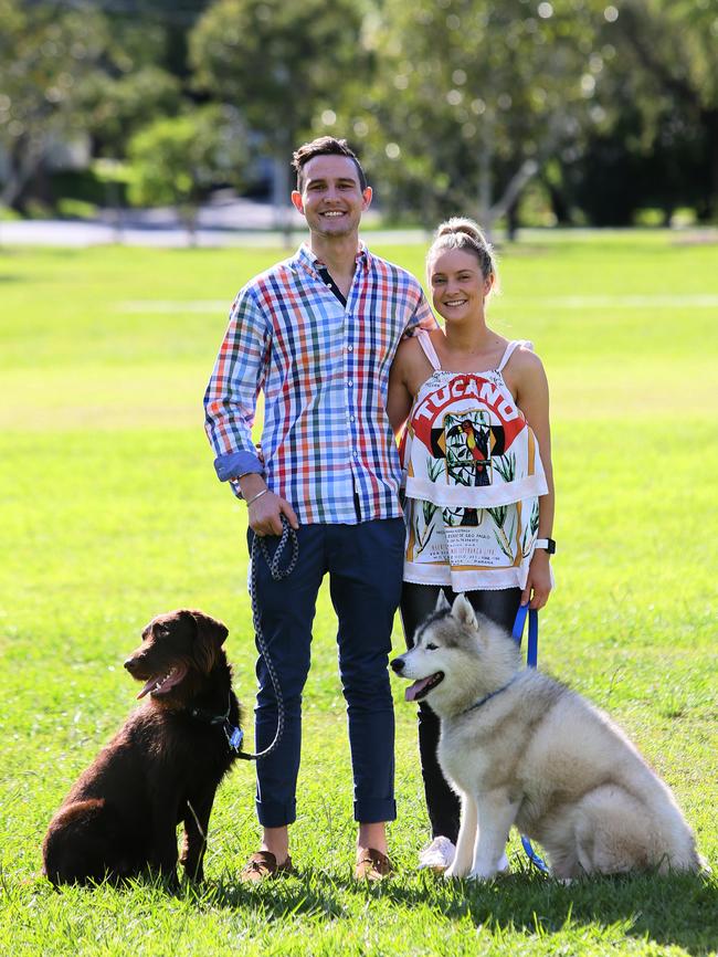 Hugo Toovey and his partner Amber Madgwick with dogs Ernie and Iggy. Picture: AAP/Richard Waugh