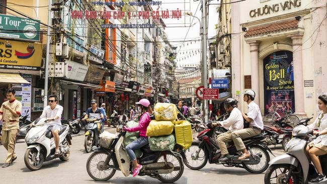 Busy motorbike traffic in Hanoi, Vietnam.