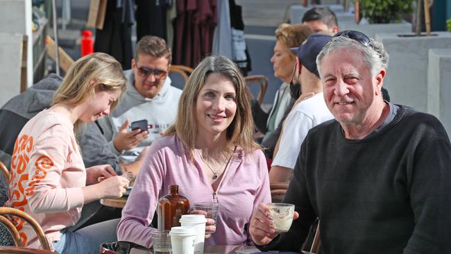 Harry Scott and Olivia Campbell enjoy breakfast at a South Melbourne cafe Melbourne begins to reopen after a long COVID lockdown. Picture: NCA NewsWire/ David Crosling