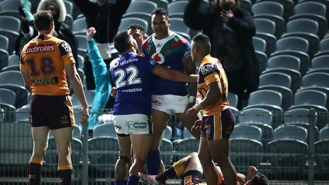 Warriors winger Ken Maumalo celebrates after scoring a try against and Broncos earlier this month. Maumalo is one of four Warriors players who will head back to New Zealand in a fortnight Picture: Getty Images