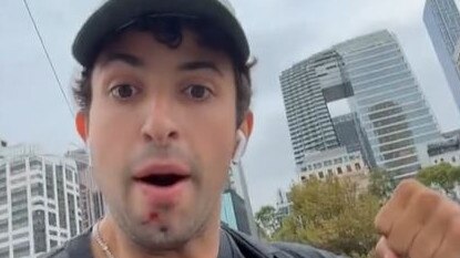 A Canadian tourist was sucked punched in Melbourne's CBD following the Grand Prix
