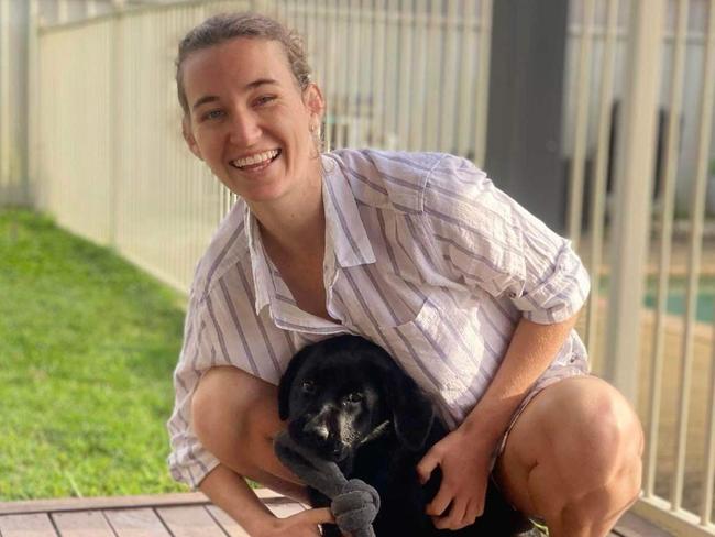 Newcastle 25-year-old Caitlyn Hincks, with her dog Martha, understands why not wanting to be a burden is preventing young people from speaking up about their mental health. Picture: Supplied.