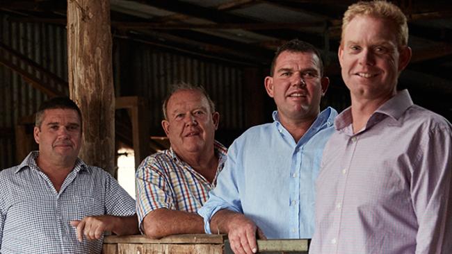 Family affair: Bruce Peat with his three sons Chris (far left), Haydn and Stuart Peat (front) on their farm at Bunnaloo in southern NSW.