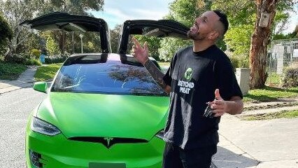 Australian tennis player Nick Kyrgios with his bright green Tesla. Picture: Instagram