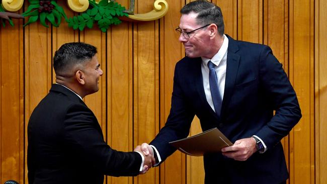 The investiture of newly elected Townsville City Councillors at the council chambers. Townsville City Council’s former CEO Prins Ralston and Mayor Troy Thompson shake hands during the swearing in ceremony. Picture: Evan Morgan