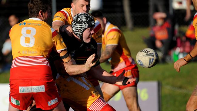 Tyson Wicks offloading the ball. Picture: Leigh Jensen