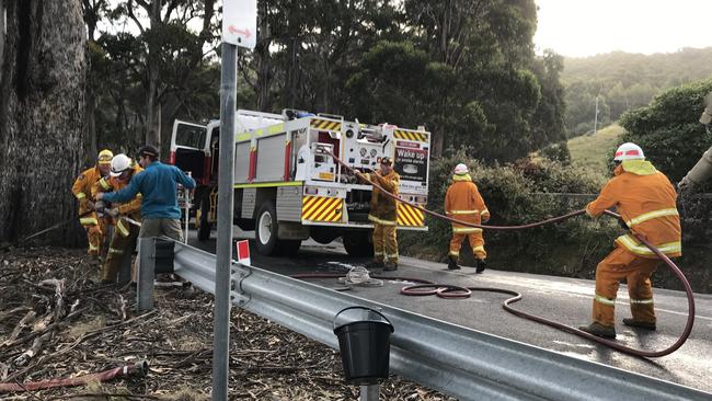 Firefighters prepare for the possibility of fire as a total fire ban is declared across the state. Picture: EDDIE SAFARIK