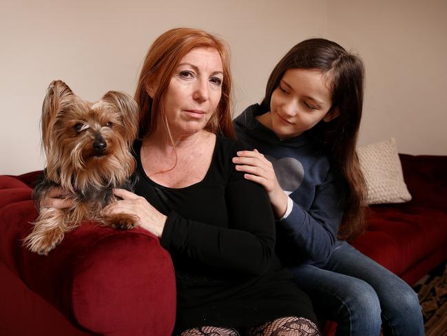 Tracy Cahn and daughter Isabelle are devastated after their dog Lola was ordered to move out of the unit block they live in. Picture: Sam Ruttyn