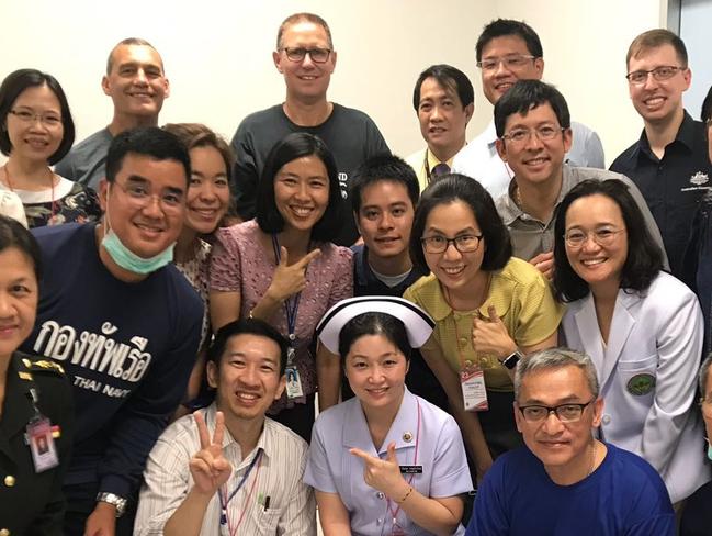 Dr Richard Harris and Craig Challen with hospital staff in Thailand. Picture: Supplied