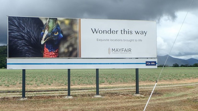 A sign near Mission Beach advertising Mayfair Iconic Properties.