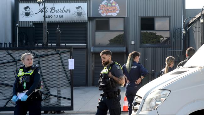 Police at the scene of a firebombed tobacco shop in Epping. Picture: NewsWire / Andrew Henshaw