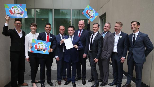 Representatives from the equality campaign with Liberal Politicians Lee Carnie, Anna Brown, Alex Greenwich, Tim Wilson MP, Senator Dean Smith, Trent Zimmerman MP, Tom Snow, Corey Irlam, Tiernan Brady and Trevor Evans MP. Picture: Kym Smith.