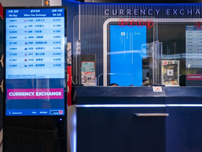 A blue screen is displayed at a currency exchange store at the Hong Kong International Airport on July 19, 2024 in Hong Kong, China. Picture: Anthony Kwan/Getty Images