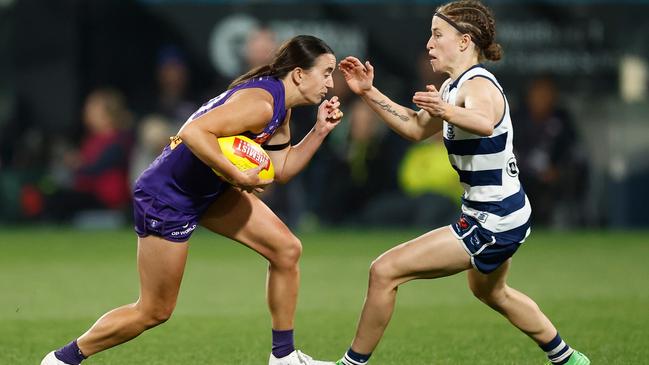 Geelong’s Mikayla Bowen closes in on Fremantle’s Laura Pugh. Picture: Michael Willson/AFL Photos via Getty Images