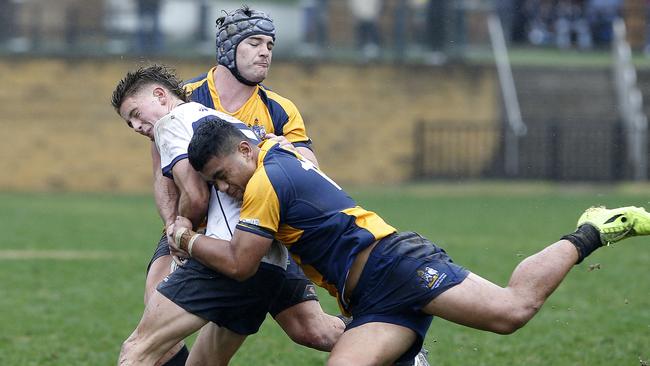 NSW's Jackson Lill getting plenty of attention from ACT at the recent Australian School Rugby Championships at Knox. Pic: John Appleyard