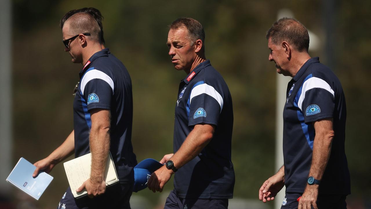 Alastair Clarkson with North assistants during the practice match against Collingwood. Picture: Daniel Pockett/Getty Images