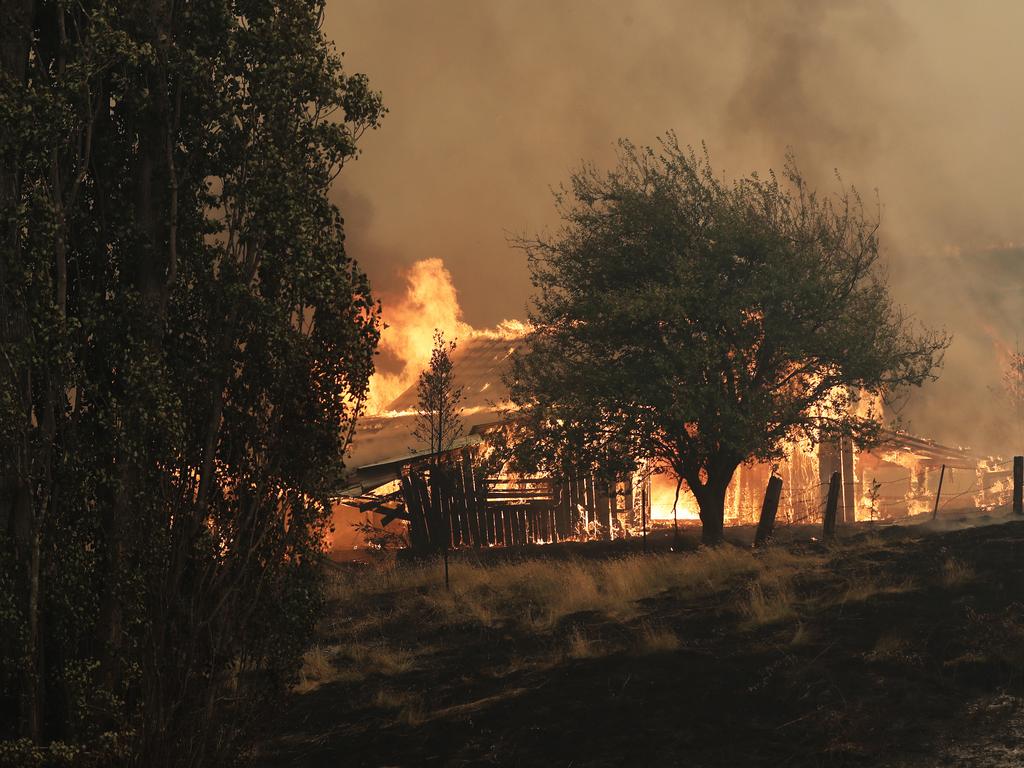 A barn engulfed in flames on Donnelleys Road, Geeveston, Picture: LUKE BOWDEN