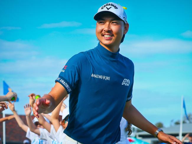 Min Woo Lee of Australia reacts following his victory on the final day of the Australian PGA Championship at the Royal Queensland Golf Club in Brisbane on November 26, 2023. (Photo by Patrick HAMILTON / AFP) / -- IMAGE RESTRICTED TO EDITORIAL USE - STRICTLY NO COMMERCIAL USE --