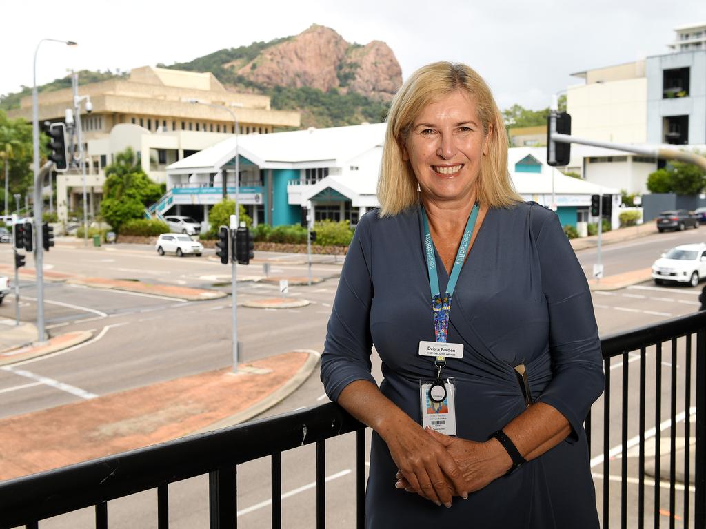 selectability CEO Debra Burden at 131 Denham St with their other property at 134 Denham St in the background. Picture: Shae Beplate.