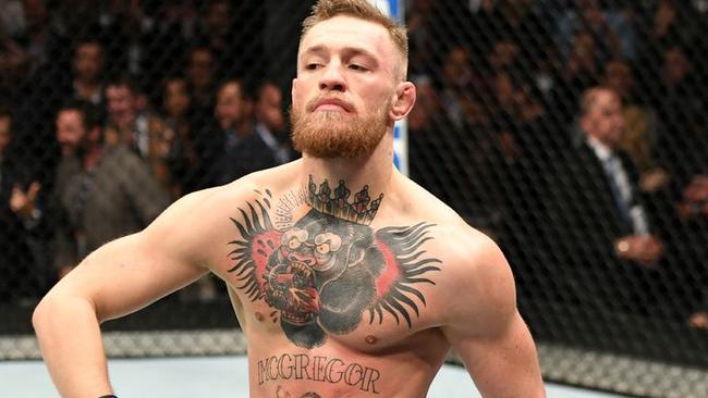 UFC fighter Conor McGregor shows the new Reebok clothing line