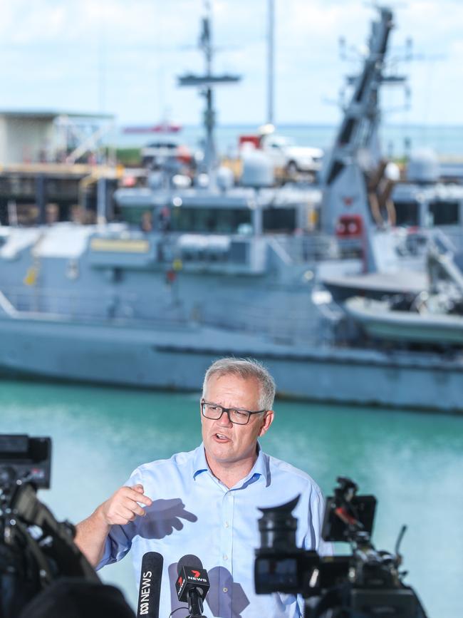 Prime Minister Scott Morrison speaks to assembled media as he visits HMAS COONAWARRA Naval Base in Darwin. Picture: Glenn Campbell