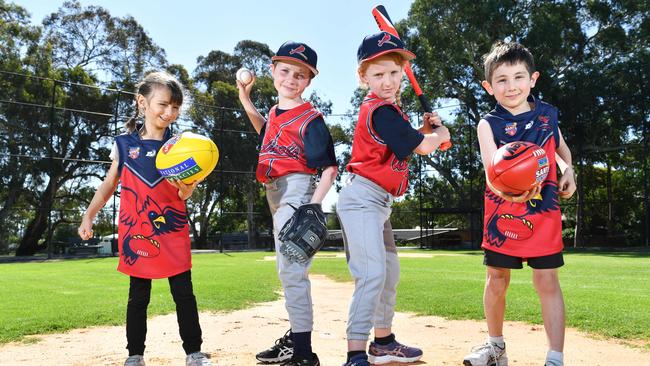 Kensington Cardinals baseball and footballers Ethan Walpole, Victoria Barreto, Samuel Barreto and Abby Bain. The Baseball Club has established junior girls and junior boys football teams for 2020. Picture: AAP/ Keryn Stevens