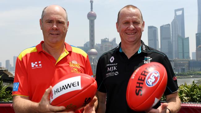 Gold Coast Suns coach Rodney Eade Port Adelaide coach Ken Hinkley in Shanghai.