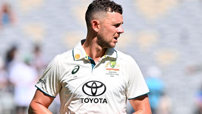 Australia's Josh Hazlewood will miss the second Test in Adelaide. (Photo by SAEED KHAN / AFP)