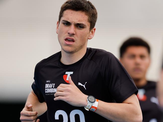 MELBOURNE, AUSTRALIA - OCTOBER 06: Xavier Ivisic (Victoria Country - Geelong Falcons) competes in the 2km time trial during the Telstra AFL State Draft Combine at MSAC on October 06, 2024 in Melbourne, Australia. (Photo by Dylan Burns/AFL Photos via Getty Images)