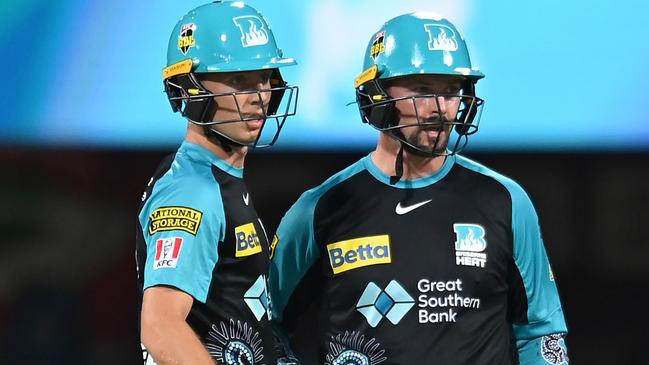 BRISBANE, AUSTRALIA - JANUARY 07: Nathan McSweeney and Colin Munro of the Heat look on during the BBL match between Brisbane Heat and Hobart Hurricanes at The Gabba, on January 07, 2024, in Brisbane, Australia. (Photo by Albert Perez/Getty Images)