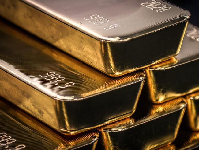 TOPSHOT - Gold bullion bars are pictured after being inspected and polished at the ABC Refinery in Sydney on August 5, 2020. - Gold prices hit 2,000 USD an ounce on markets for the first time on August 4, the latest surge in a commodity seen as a refuge amid economic uncertainty. (Photo by DAVID GRAY / AFP)