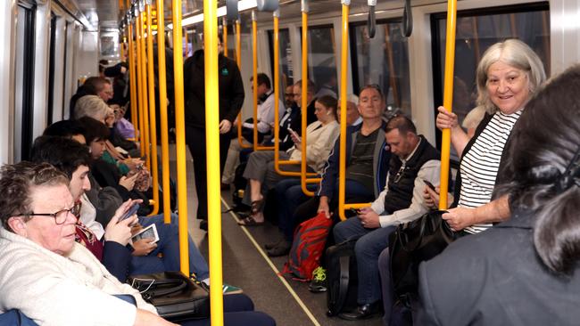 A packed train leaves Beenleigh station. Picture: Steve Pohlner