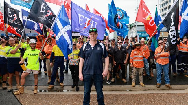 CFMEU Far North Queensland organiser Rolly Cummins rallies union members from the ETU, QBuild, RoadTek and the CFMEU in front of Cairns MP Michael Healy’s office. Picture: Brendan Radke